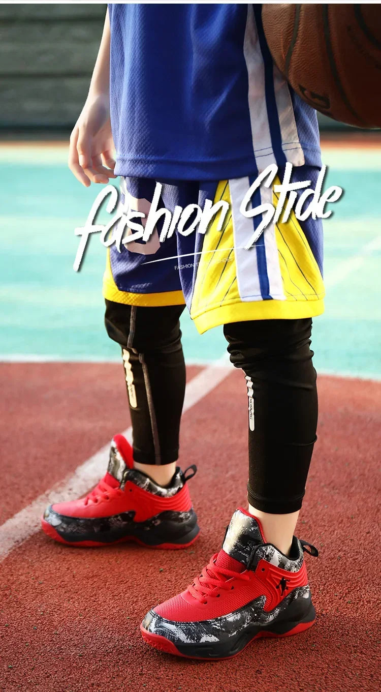 Kids basketball shoes by The Clothing Company Sydney featuring non-slip sports sneakers with vibrant design for active play.