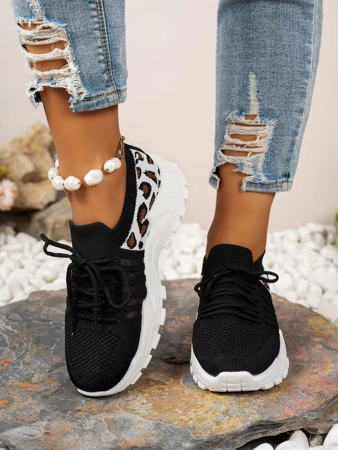 Leopard print women's waterproof sneakers from The Clothing Company Sydney, stylish footwear with a comfortable fit.