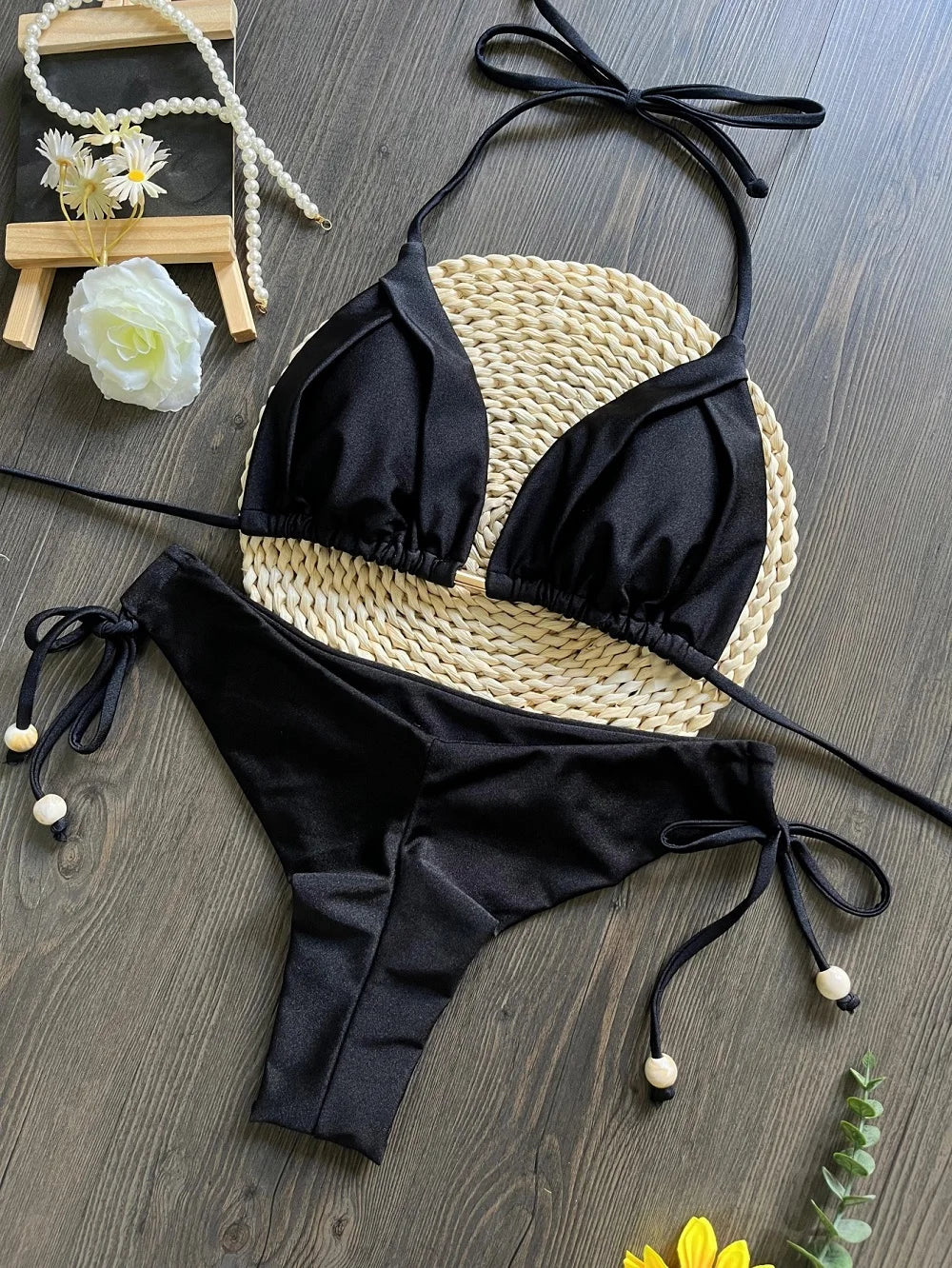 Two-piece micro bikini set for women featuring triangle swimwear, perfect for beachwear and swimming by The Clothing Company Sydney.