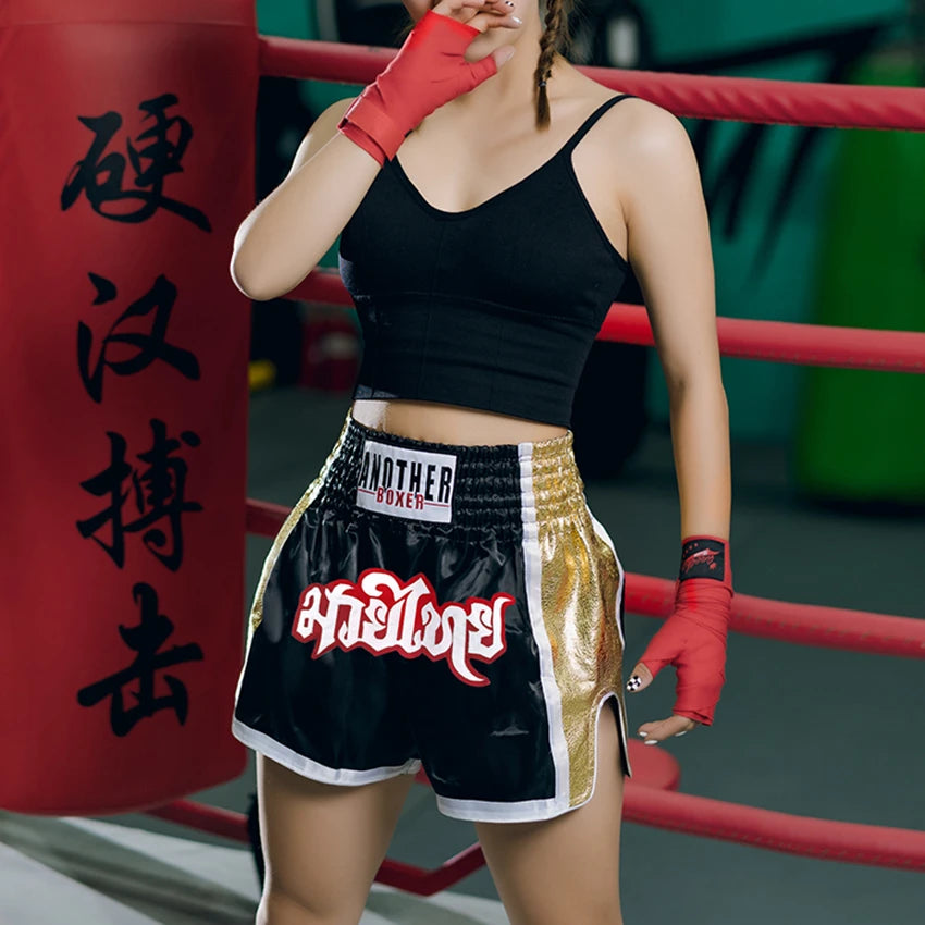 Unisex Muay Thai shorts from The Clothing Company Sydney, lightweight kickboxing and MMA training gear, shown on a model.