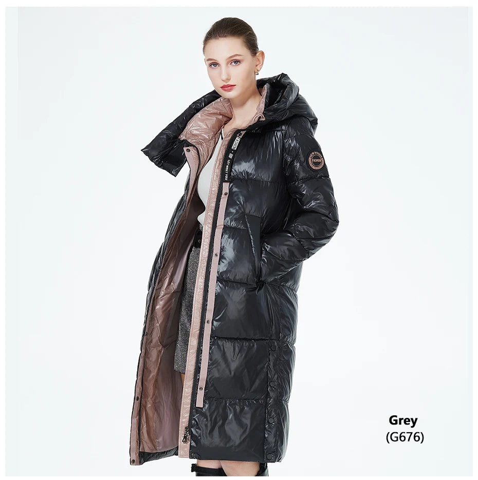 Women’s long hooded winter parka by The Clothing Company Sydney, thick quilted puffer jacket with front pockets and cozy insulation.