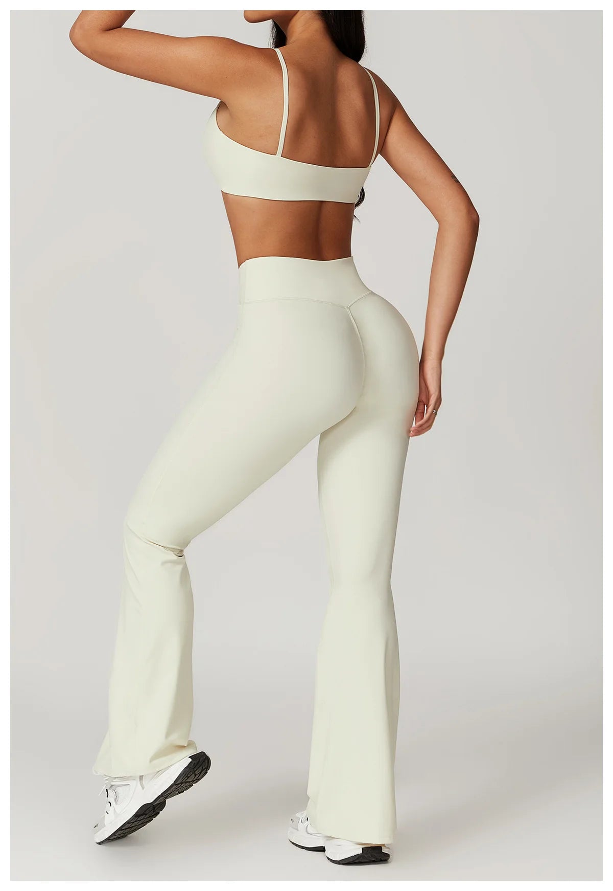 Two-piece women's fitness set by The Clothing Company Sydney with a crop top, sports bra, and leggings for gym and yoga workouts.