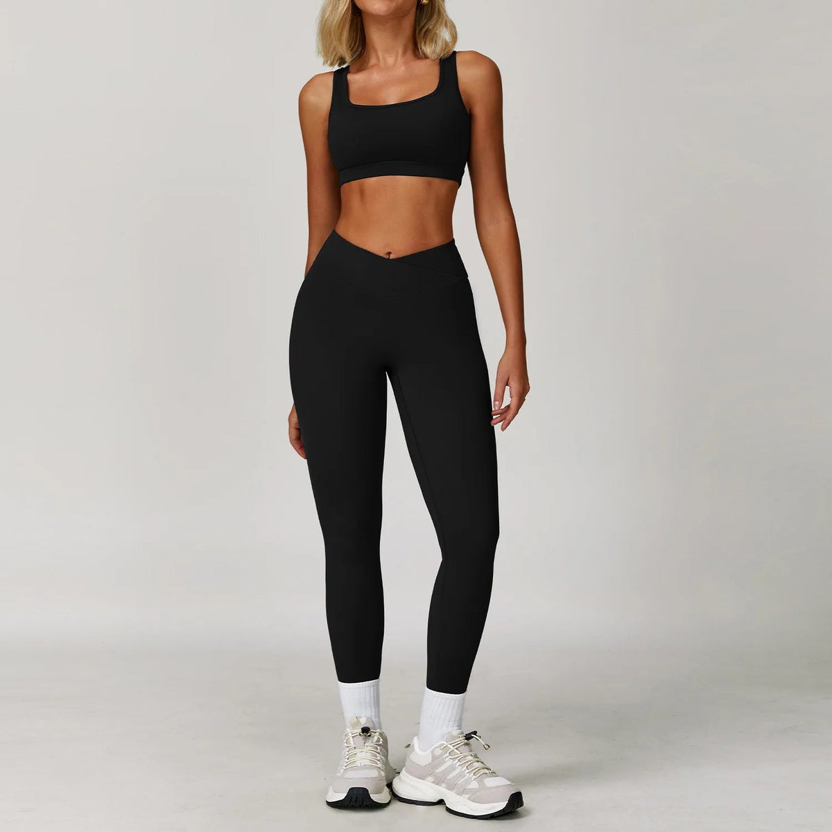 Women's fitness yoga gym clothes set by The Clothing Company Sydney, includes sports bra and matching leggings for workout and running.