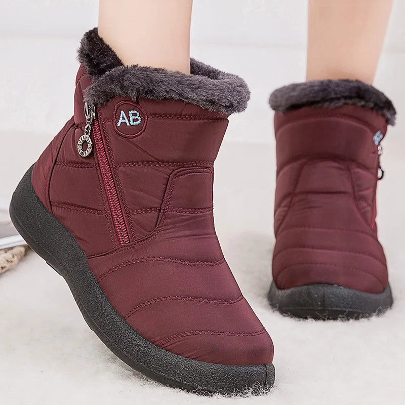 Women’s winter snow boots by The Clothing Company Sydney with warm fur lining, ankle height, and durable footwear for cold weather.