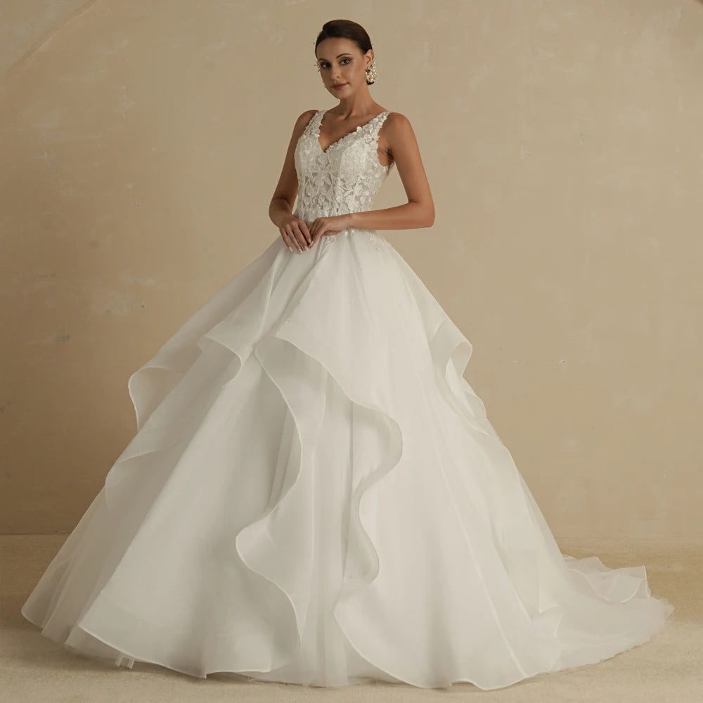 Ivory strapless A-line glitter wedding dress with off-the-shoulder design and bling accents, designed for brides by The Clothing Company Sydney
