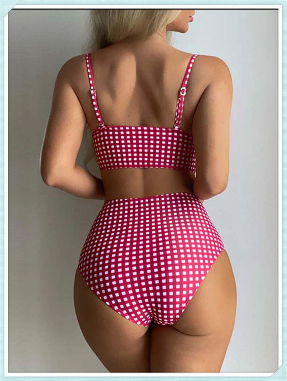 High waist printed swimsuit by The Clothing Company Sydney with straps and padding, ideal for beachwear and swimming activities.