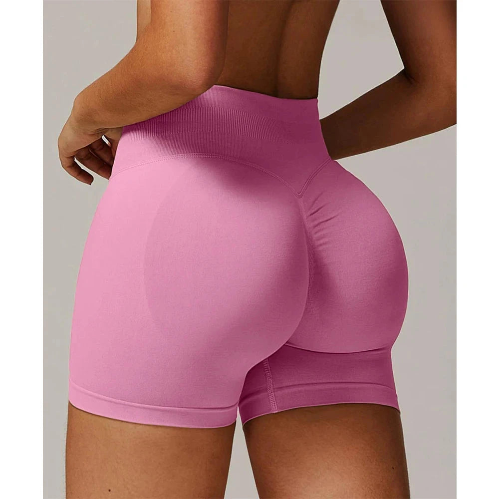 Solid seamless half pants for women by The Clothing Company Sydney, soft fitness shorts ideal for yoga, running, and cycling.