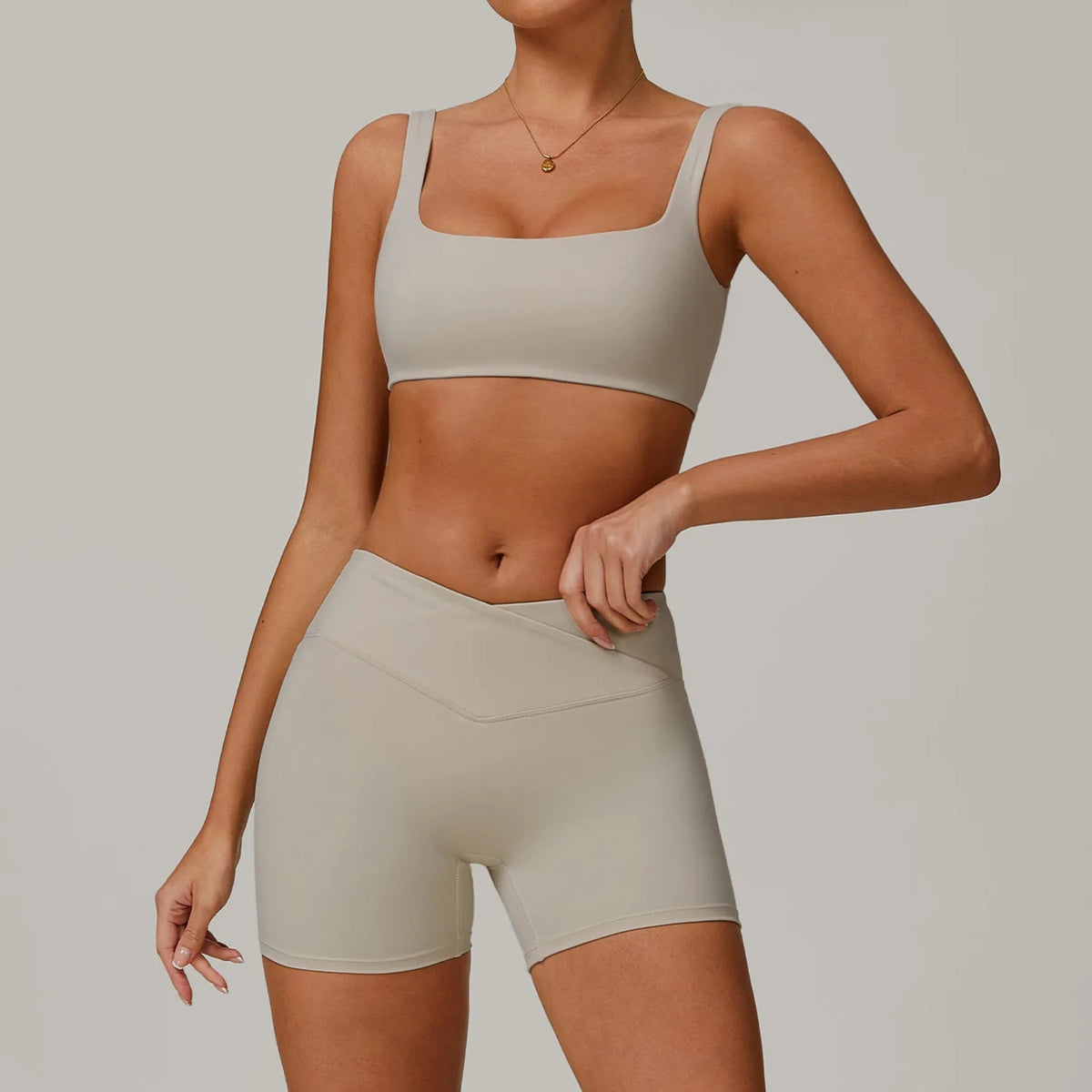 Two-piece women's yoga and workout fitness set with sports bra and leggings by The Clothing Company Sydney, ideal for gym and running.