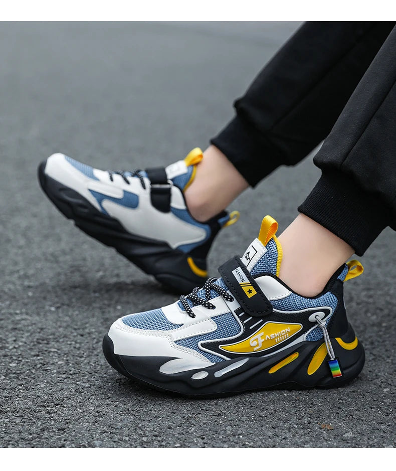 Kids' breathable mesh sneakers by The Clothing Company Sydney with non-slip sole and hook & loop closure for ages 7-13.