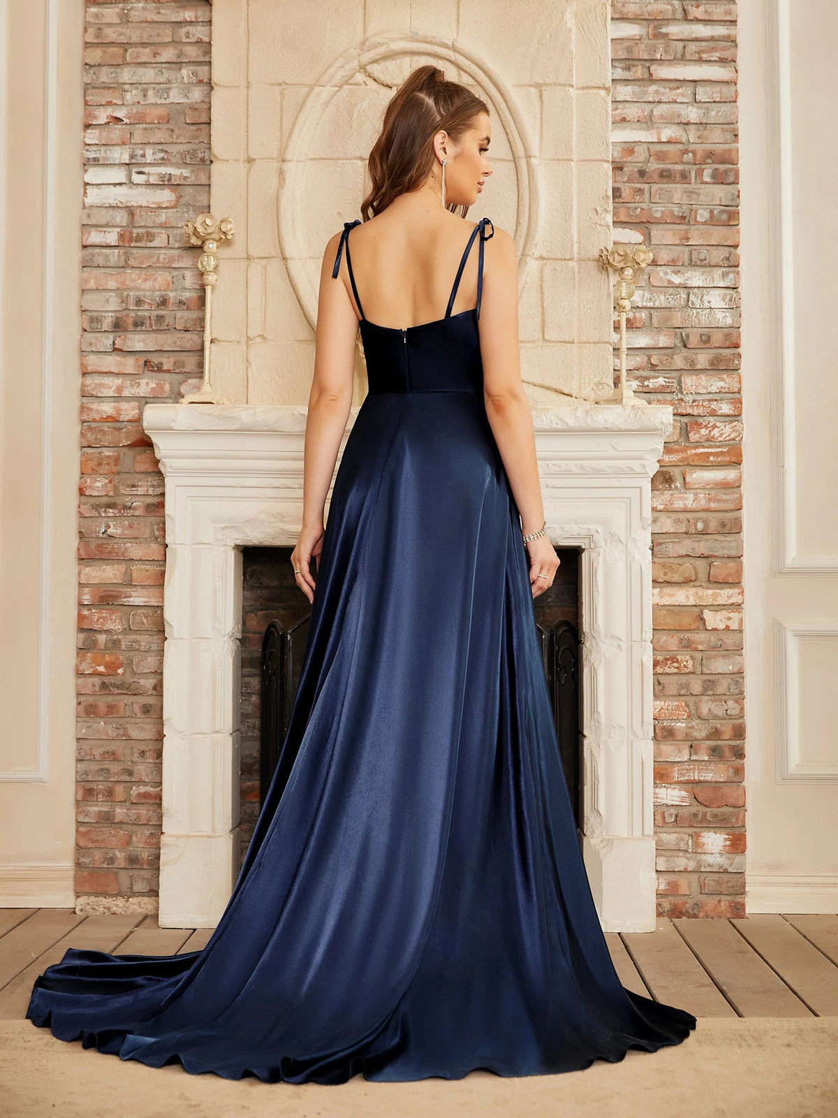 Mint green satin bridesmaid dress with side slit, backless design, spaghetti straps, long evening gown for summer events.