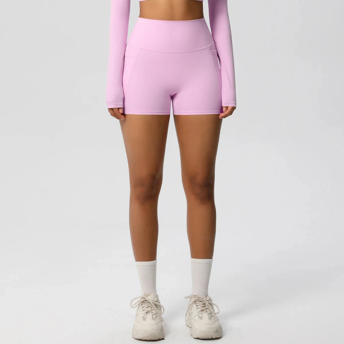 High-waisted bicycle yoga shorts by The Clothing Company Sydney with pockets, quick-drying, breathable fabric, ideal for workout and fitness.