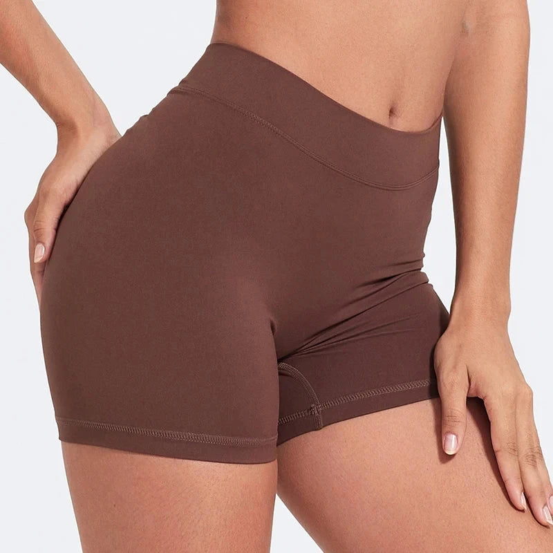 High-waisted V-back fitness shorts by The Clothing Company Sydney, made of nylon, designed for yoga, training, and sports activities.