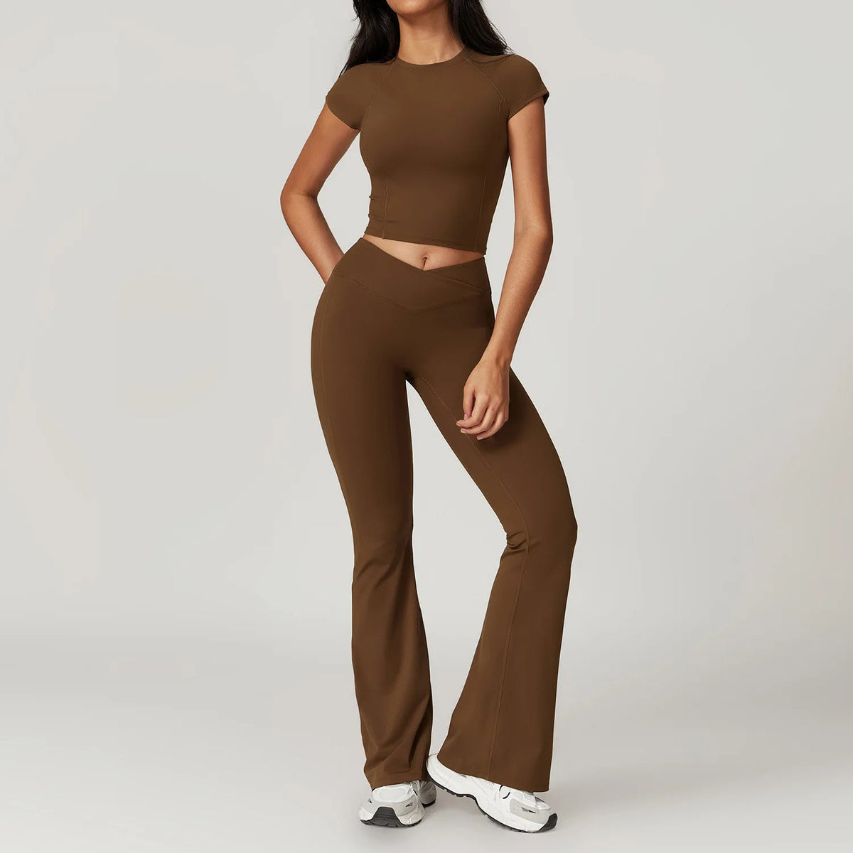 Two-piece women's yoga and fitness sportswear set, including a crop top, sports bra, and leggings from The Clothing Company Sydney.