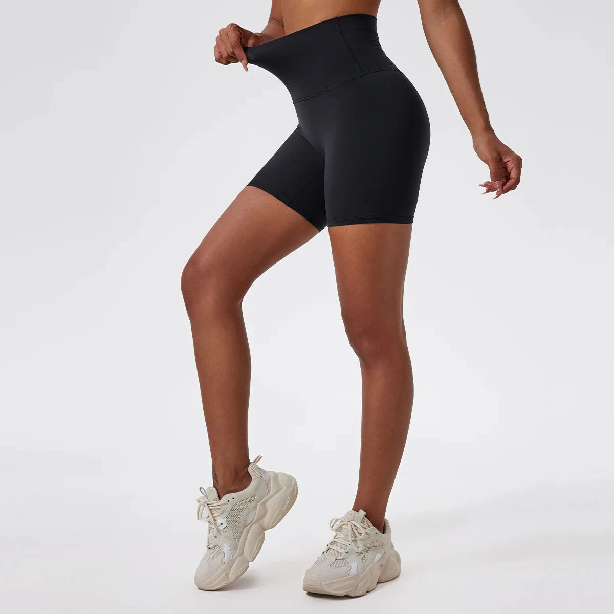 High-waist yoga shorts from The Clothing Company Sydney, designed for women’s gym workouts and running with supportive fit.