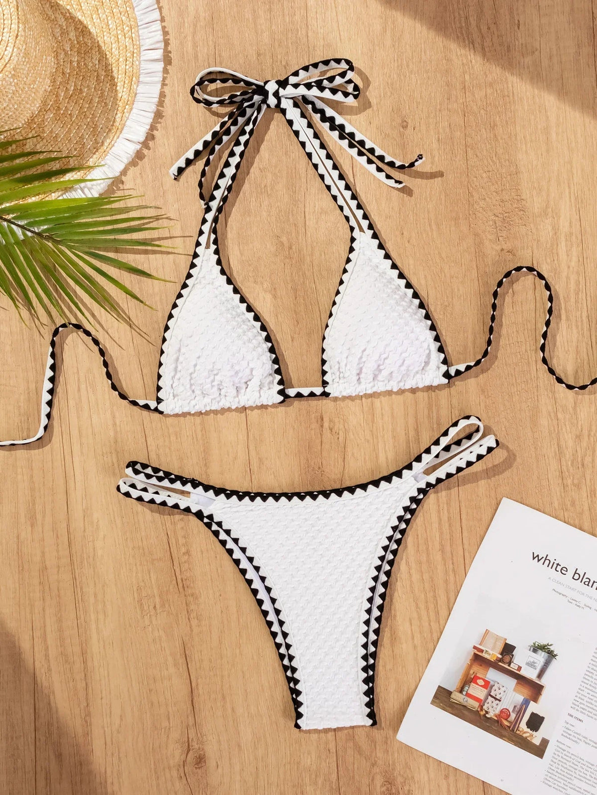 White 2-piece knitted bikini for women featuring patchwork design, push-up cups, thong cut, perfect for summer beachwear.