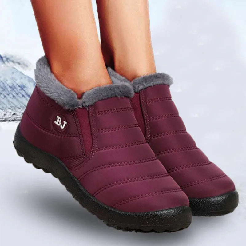 Women’s waterproof fur snow boots by The Clothing Company Sydney, slip-on ankle shoes with cozy fur lining and sturdy sole.