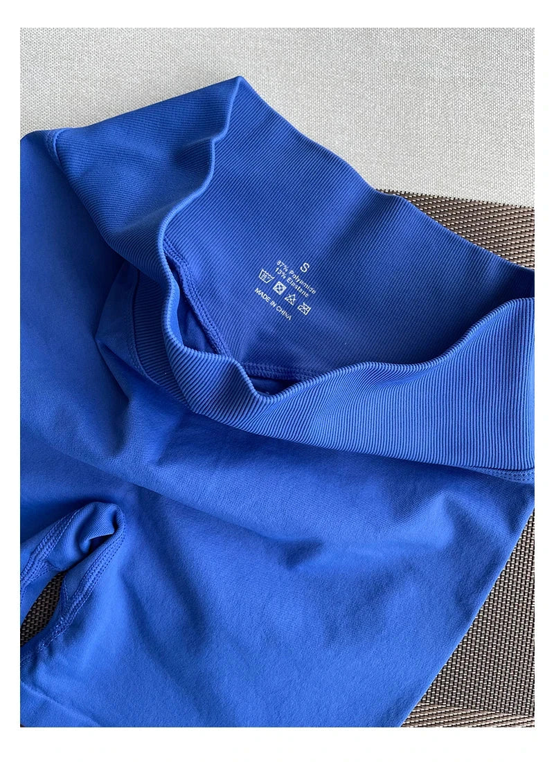 Women’s solid seamless half pants from The Clothing Company Sydney, soft fitness shorts ideal for yoga, gym, running, and cycling.