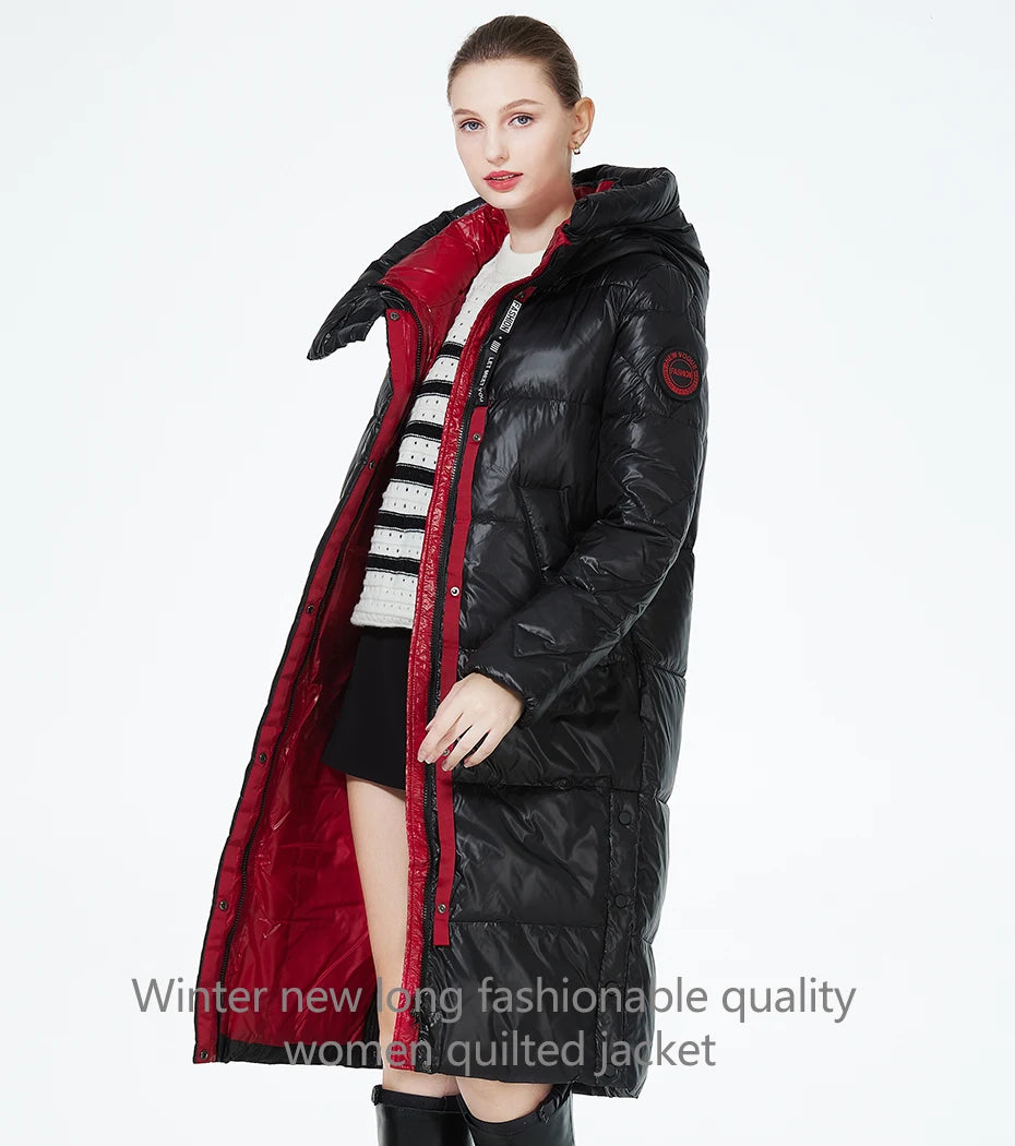 Women’s long hooded winter parka by The Clothing Company Sydney, thick quilted puffer jacket with front pockets.