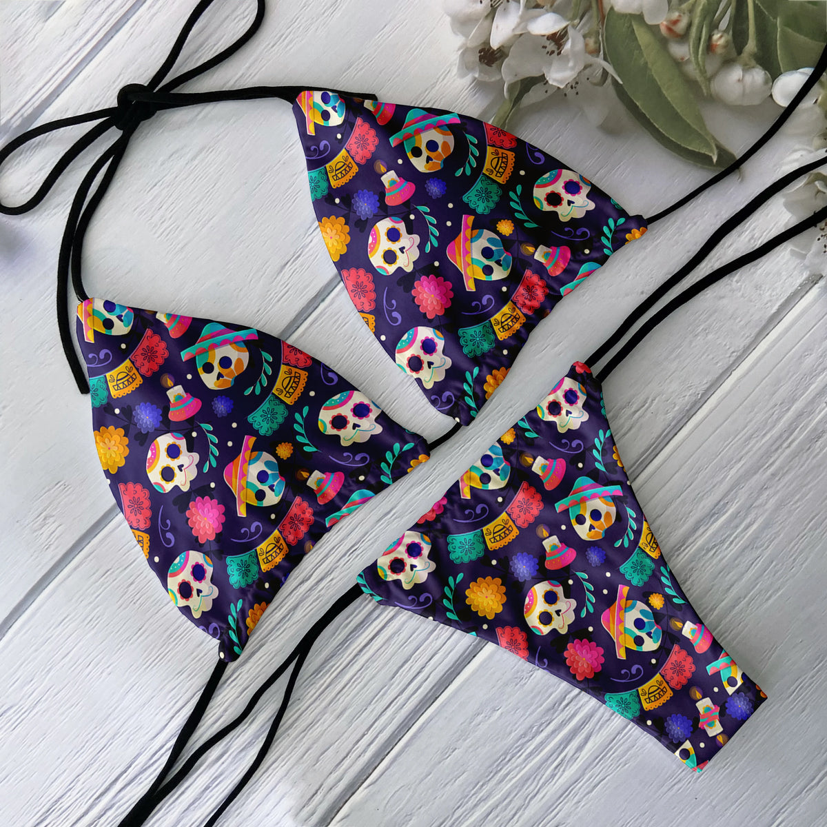Backless 2-piece bikini set for women with skull print, low waist design, perfect for beach surfing and vacation by The Clothing Company Sydney