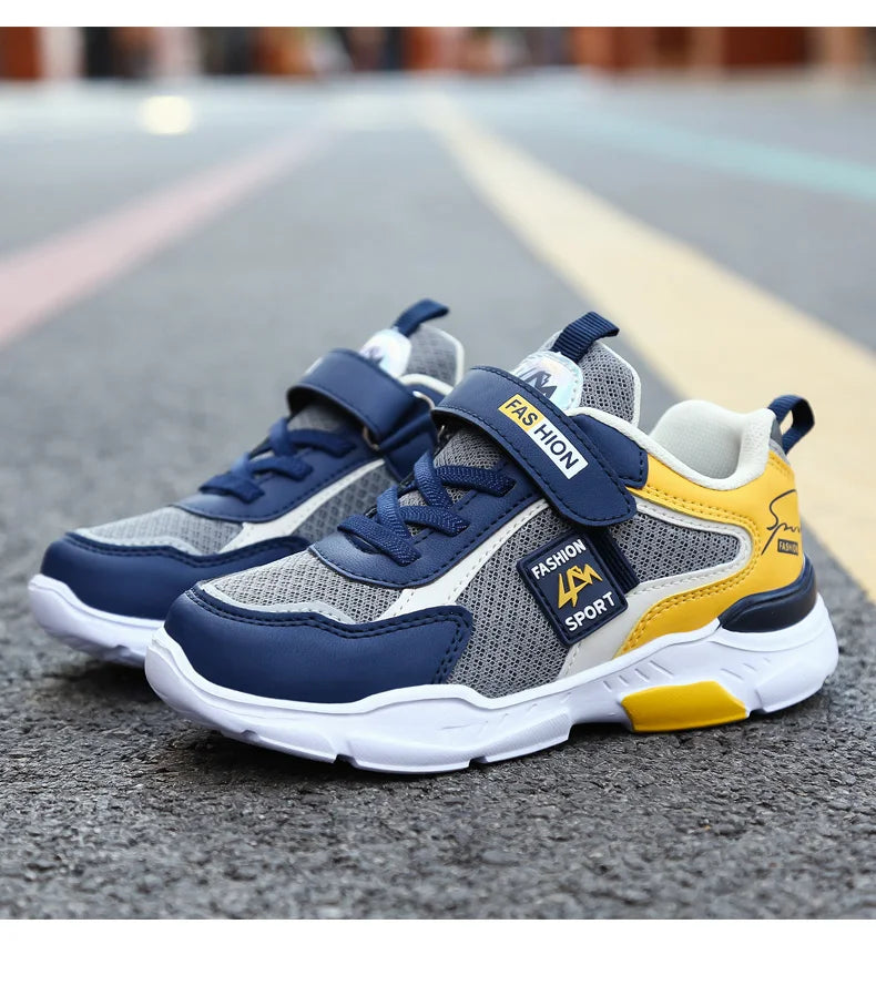 Kids’ breathable summer sneakers by The Clothing Company Sydney, mesh running shoes with hook and loop straps for boys and girls.