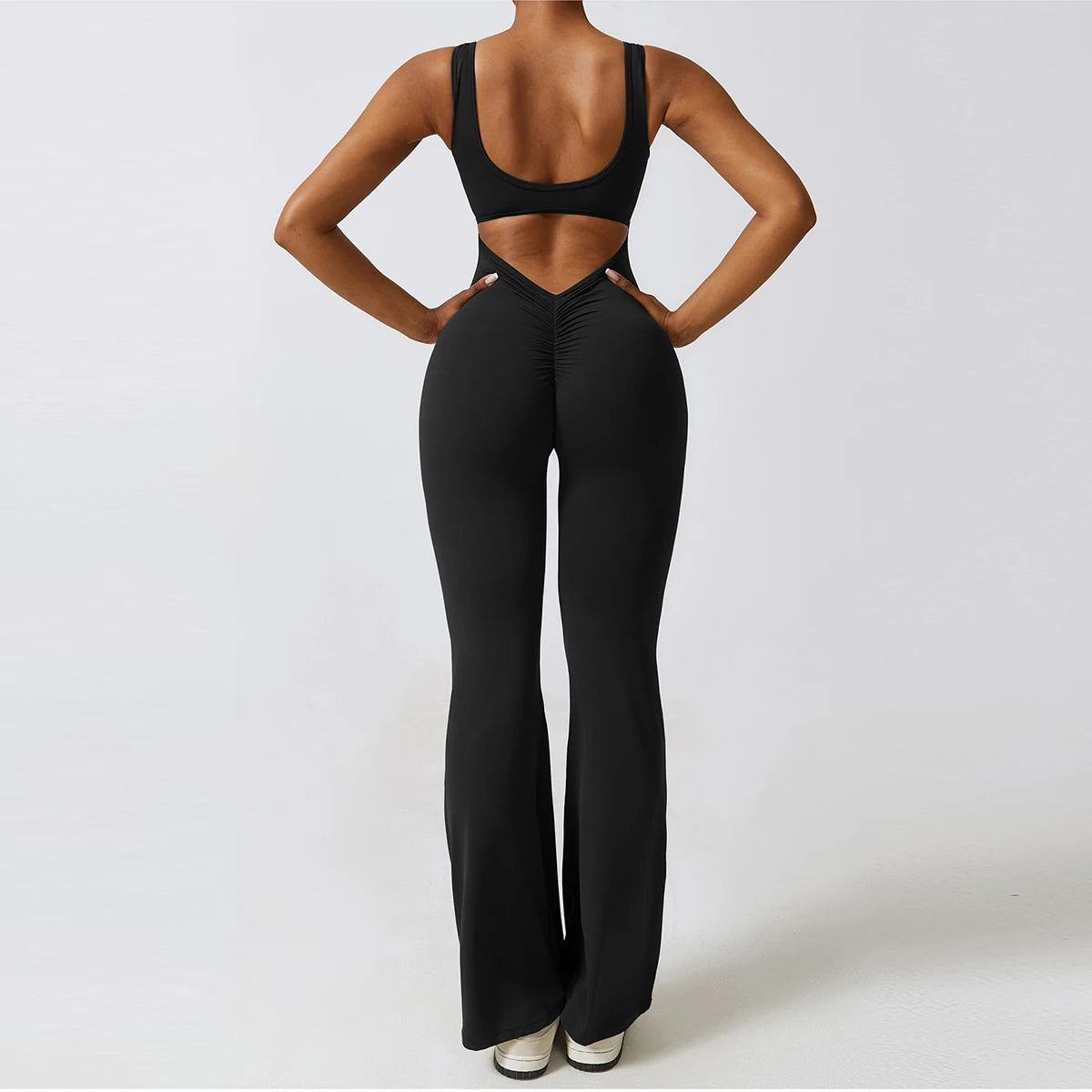 Open back V jumpsuit gym set for women, featuring stretch fabric, suitable for yoga, training, and fitness workouts.