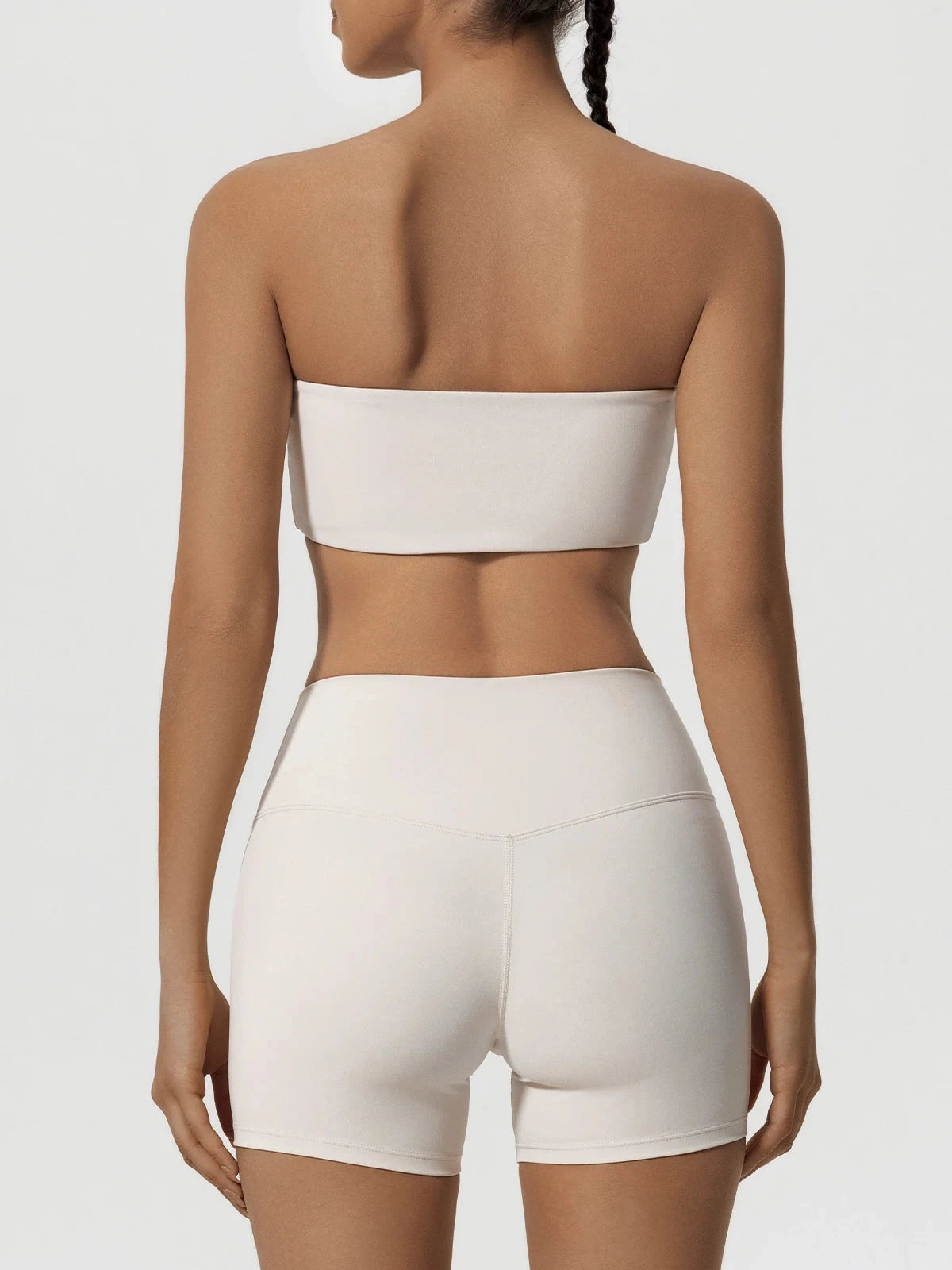 Two-piece women's fitness sports set including a strapless sports bra and matching gym crop top, ideal for workout and yoga sessions.