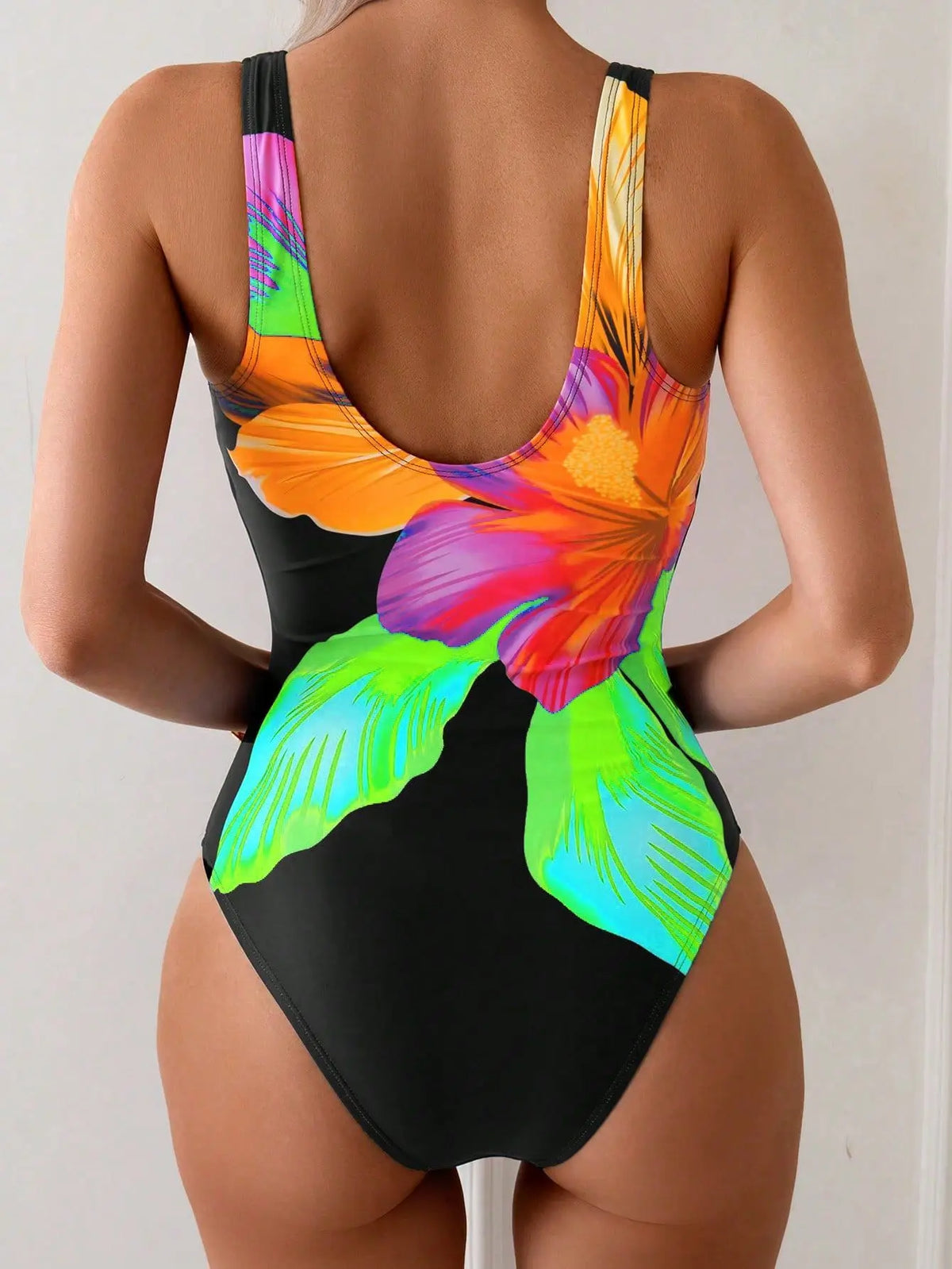 Summer print one-piece swimsuit by The Clothing Company Sydney, featuring a push-up design, ideal for beachwear and swimming.