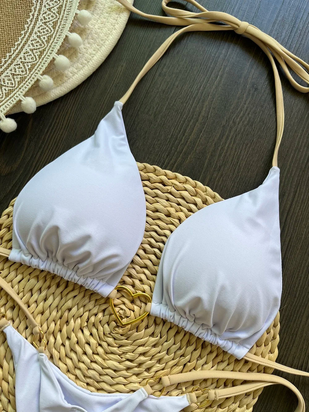 Solid color halter bikini set for women, two-piece swimsuit with triangle top and thong bottoms, from The Clothing Company Sydney.