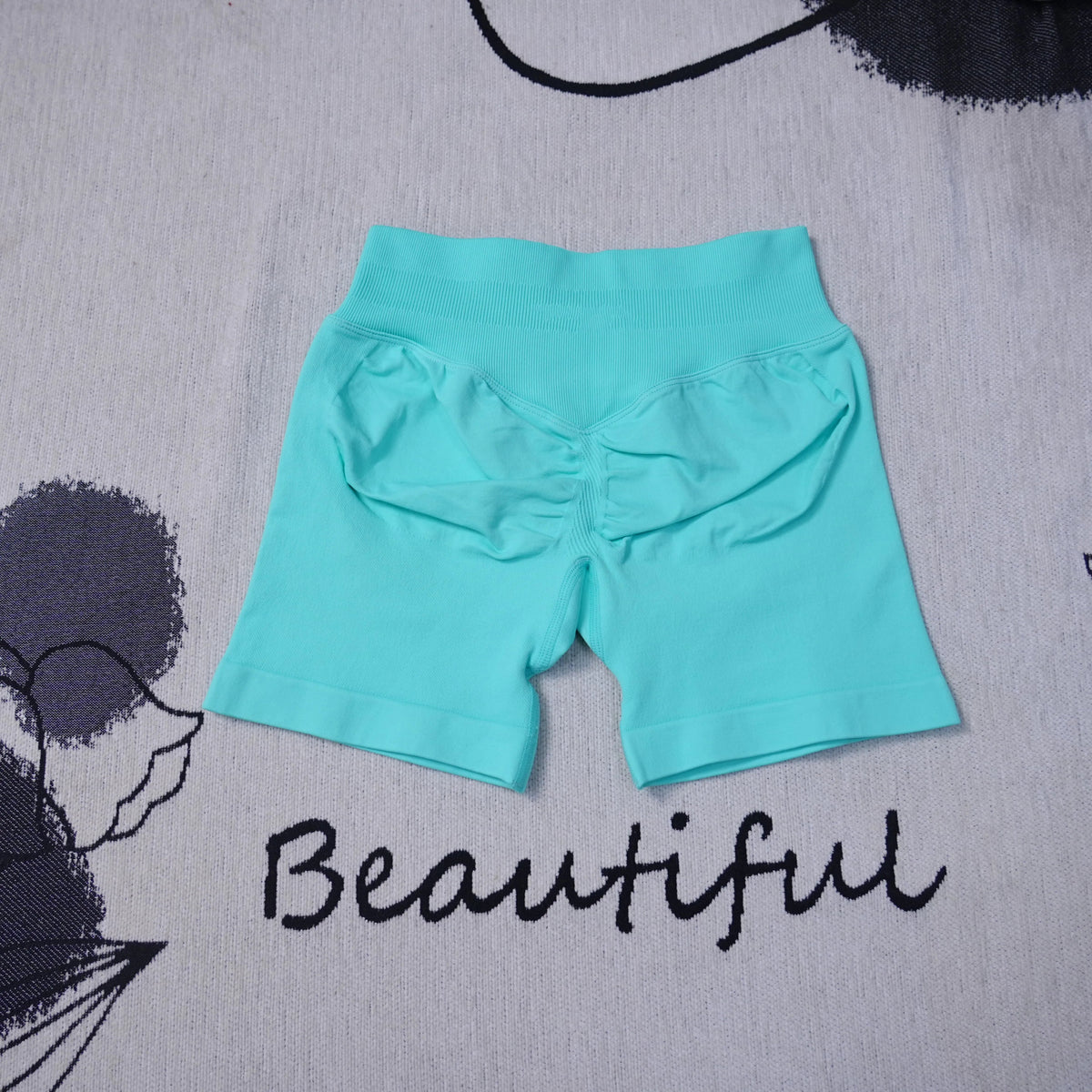 Women's high-waisted seamless yoga shorts by The Clothing Company Sydney, breathable and designed for gym, running, and biking workouts.