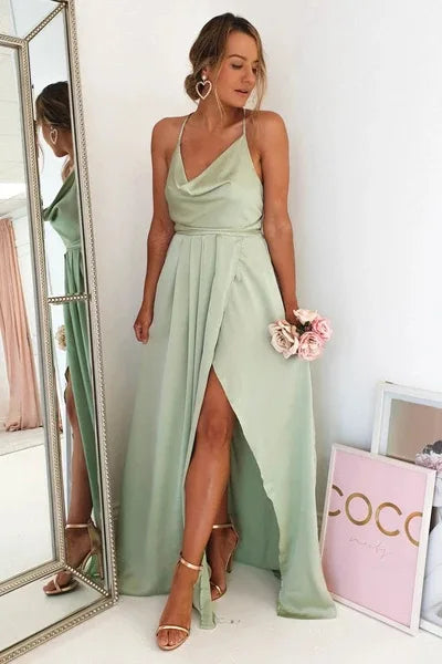 Mint green satin bridesmaid dress with side slit, backless design, spaghetti straps, long evening gown for summer weddings.