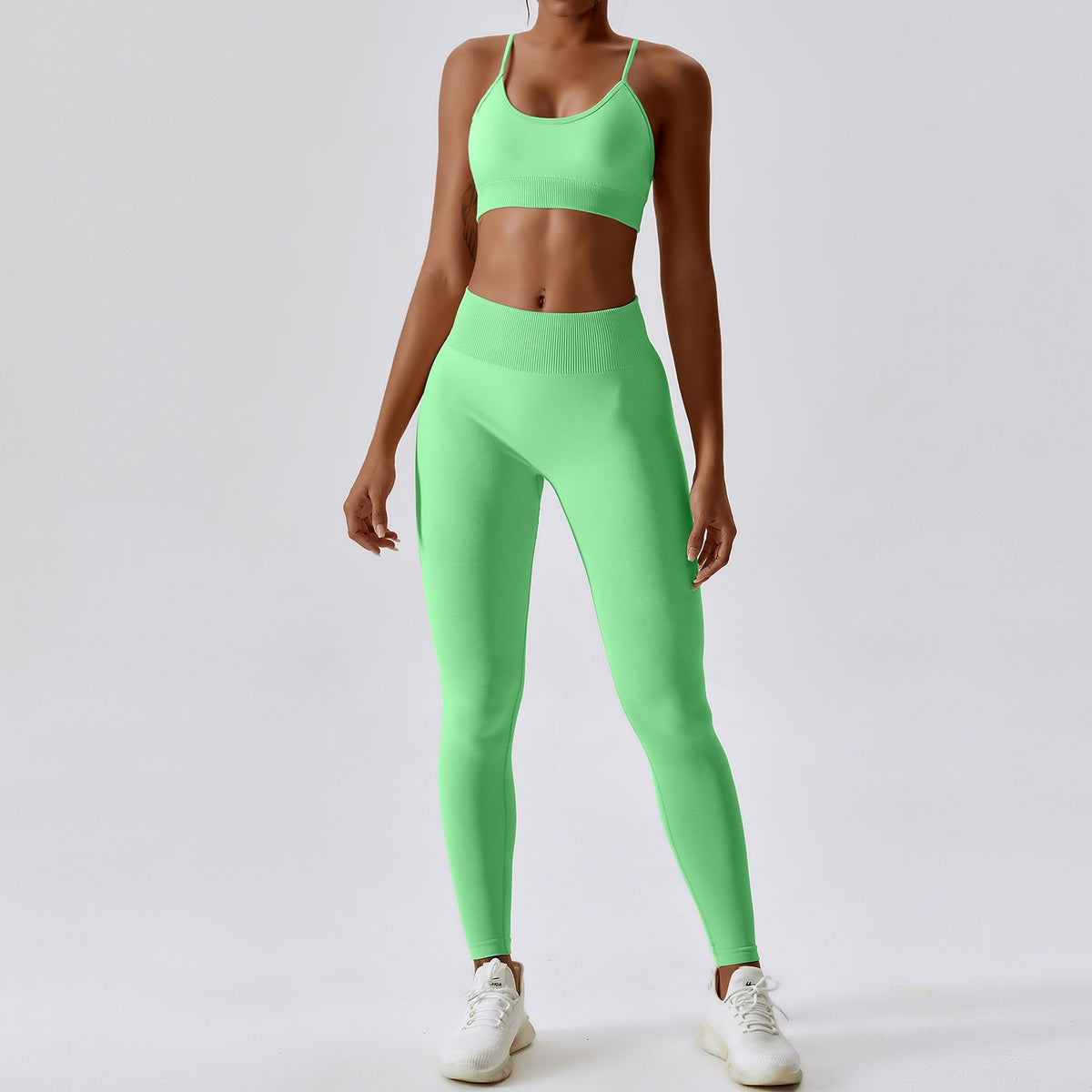 Seamless women's yoga set by The Clothing Company Sydney, including high-waist leggings and sports bra for fitness and workout.