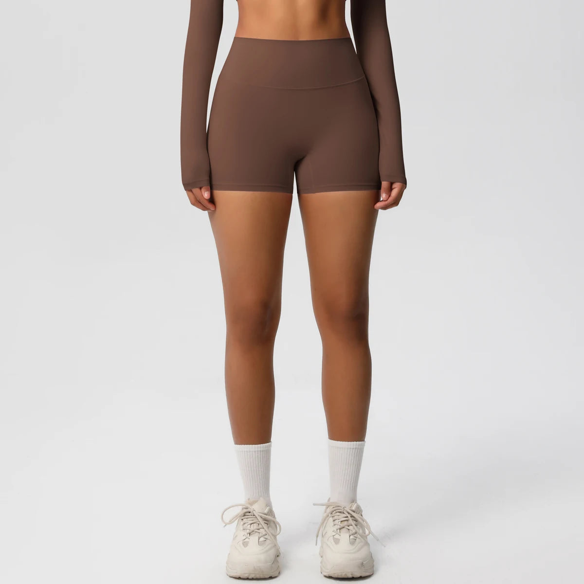 Women’s high waist yoga shorts by The Clothing Company Sydney, featuring a push-up design and athletic fit for fitness and yoga.