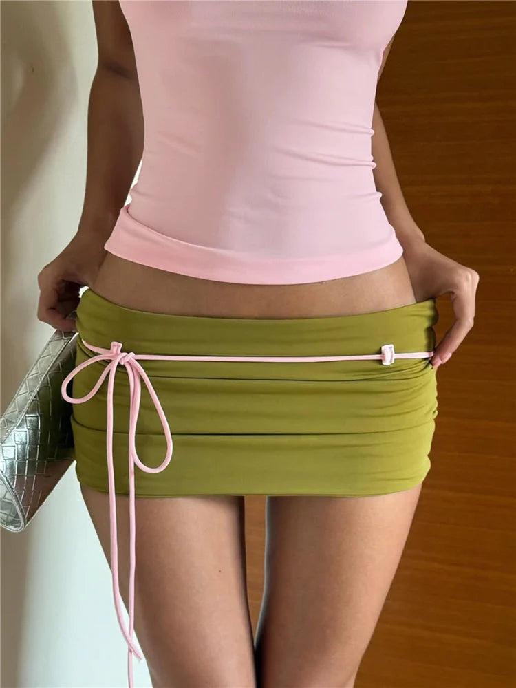 Y2K style matching set for women with a low-neck backless camisole and bandage tassel mini skirt by The Clothing Company Sydney