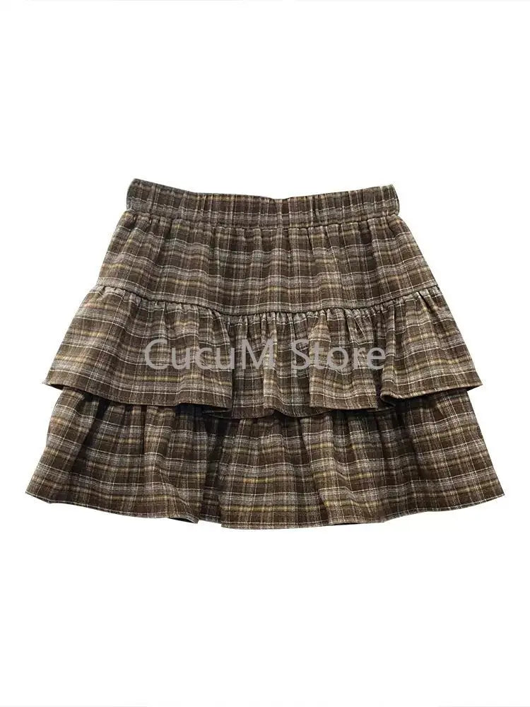 Y2k cute ruffled plaid skirt by The Clothing Company Sydney, featuring punk rock casual style for women's fashion.