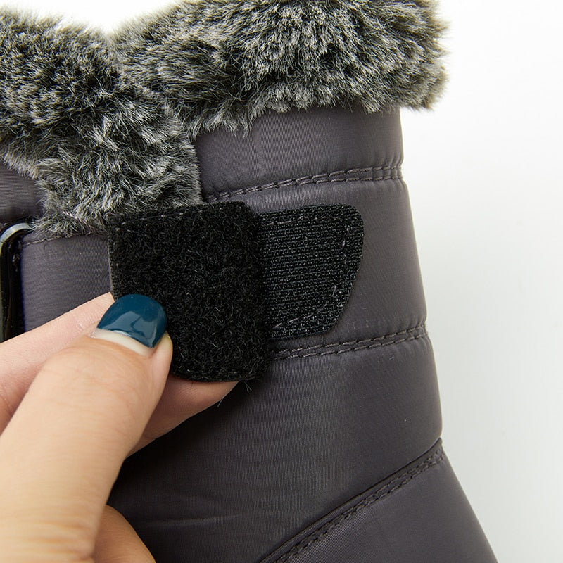Waterproof winter boots for women by The Clothing Company Sydney, faux fur lining, plush snow boots with platform and ankle design.