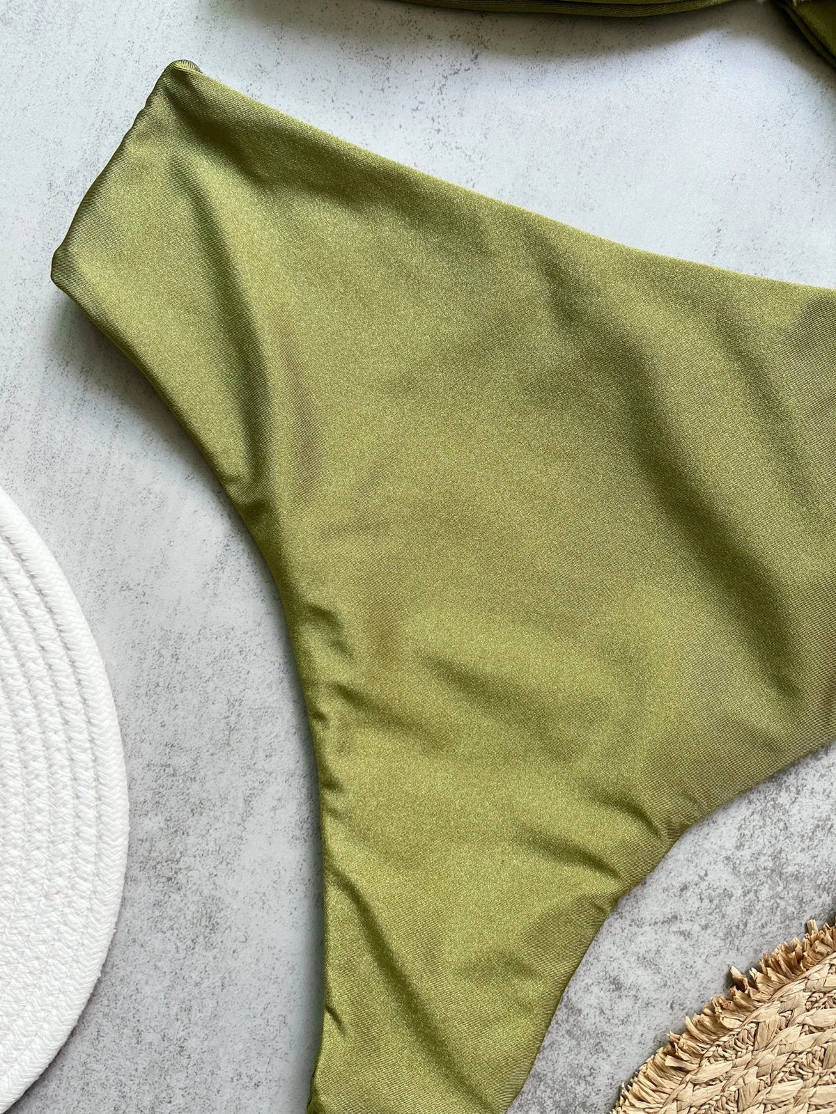 Two-piece bandeau bikini set from The Clothing Company Sydney featuring push-up cups and thong style solid swimwear for the beach.