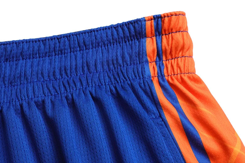 Customized reversible basketball jersey and shorts set for men, women, and kids, featuring quick-drying fabric by The Clothing Company Sydney.