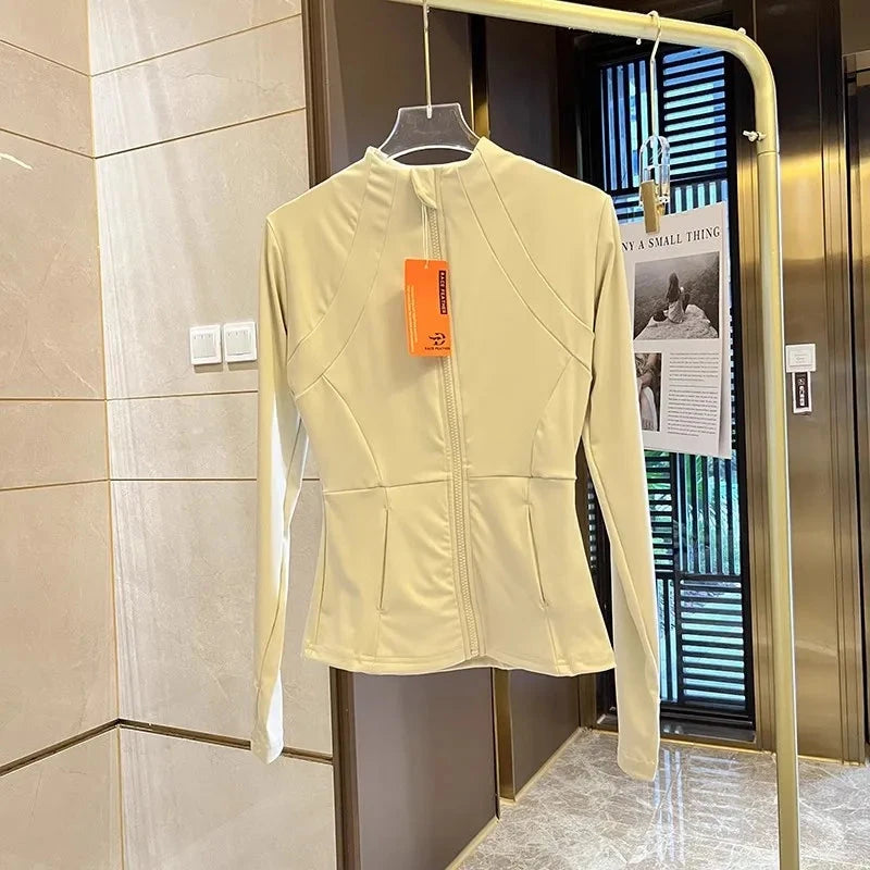 Women’s slim fit zip-up sports jacket from The Clothing Company Sydney, ideal for yoga, running, and gym workouts.