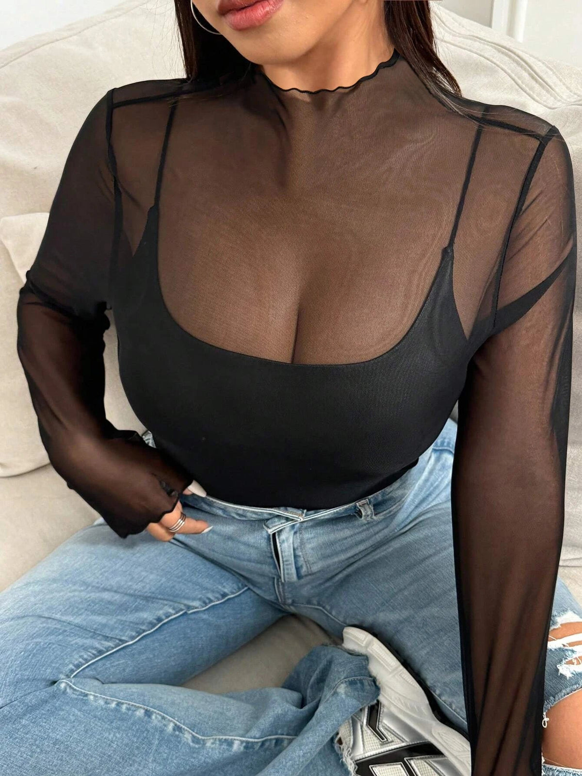 Black mesh long sleeve top for women by The Clothing Company Sydney, transparent club shirt perfect for summer and beachwear.
