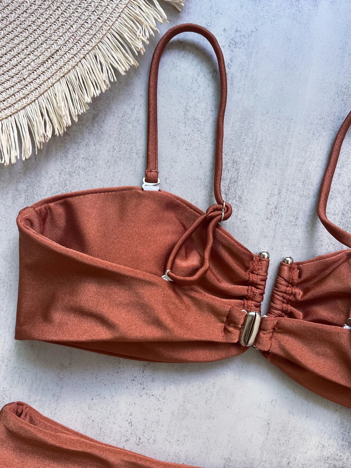 Two-piece bandeau bikini set by The Clothing Company Sydney featuring push-up design, solid color, and thong style for beachwear.