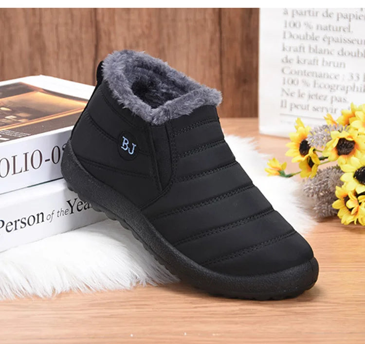 Women’s waterproof fur snow boots by The Clothing Company Sydney, slip-on ankle footwear with cozy fur lining and sturdy soles.