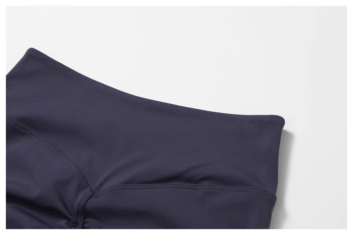 Two-piece women's fitness gym clothes set including a crop top, sports bra, leggings, and bike shorts by The Clothing Company Sydney.