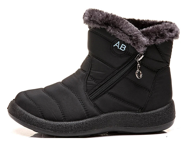 Women’s winter snow boots with warm fur lining, ankle-high footwear by The Clothing Company Sydney, ideal for cold weather.