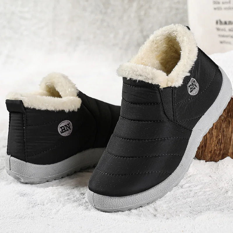 Men's slip-on winter ankle boots from The Clothing Company Sydney, waterproof snow shoes with fur lining and rugged soles.