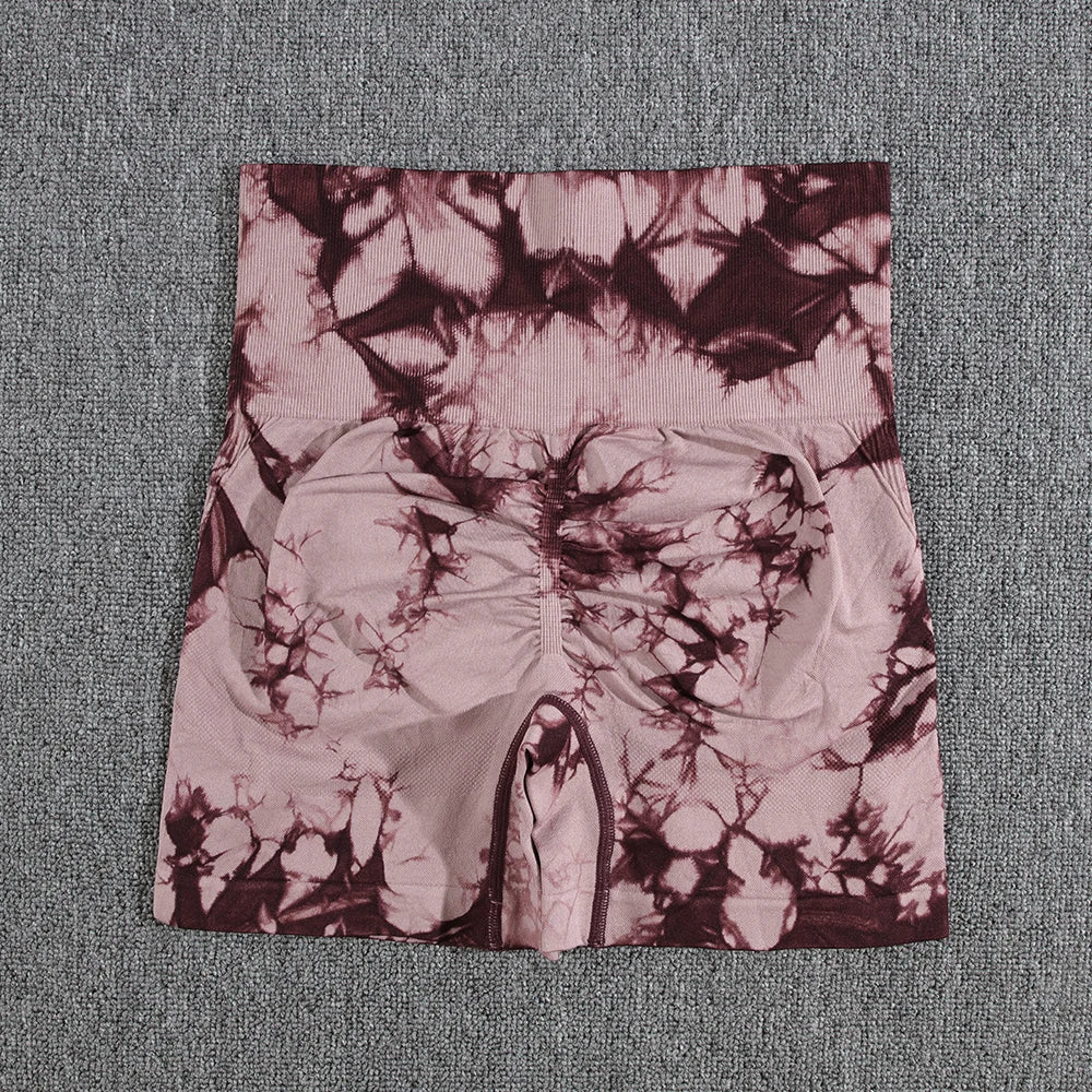 Colorful tie-dye gym shorts for women, high waist, seamless push-up design, ideal for casual, outdoor, and fitness activities.