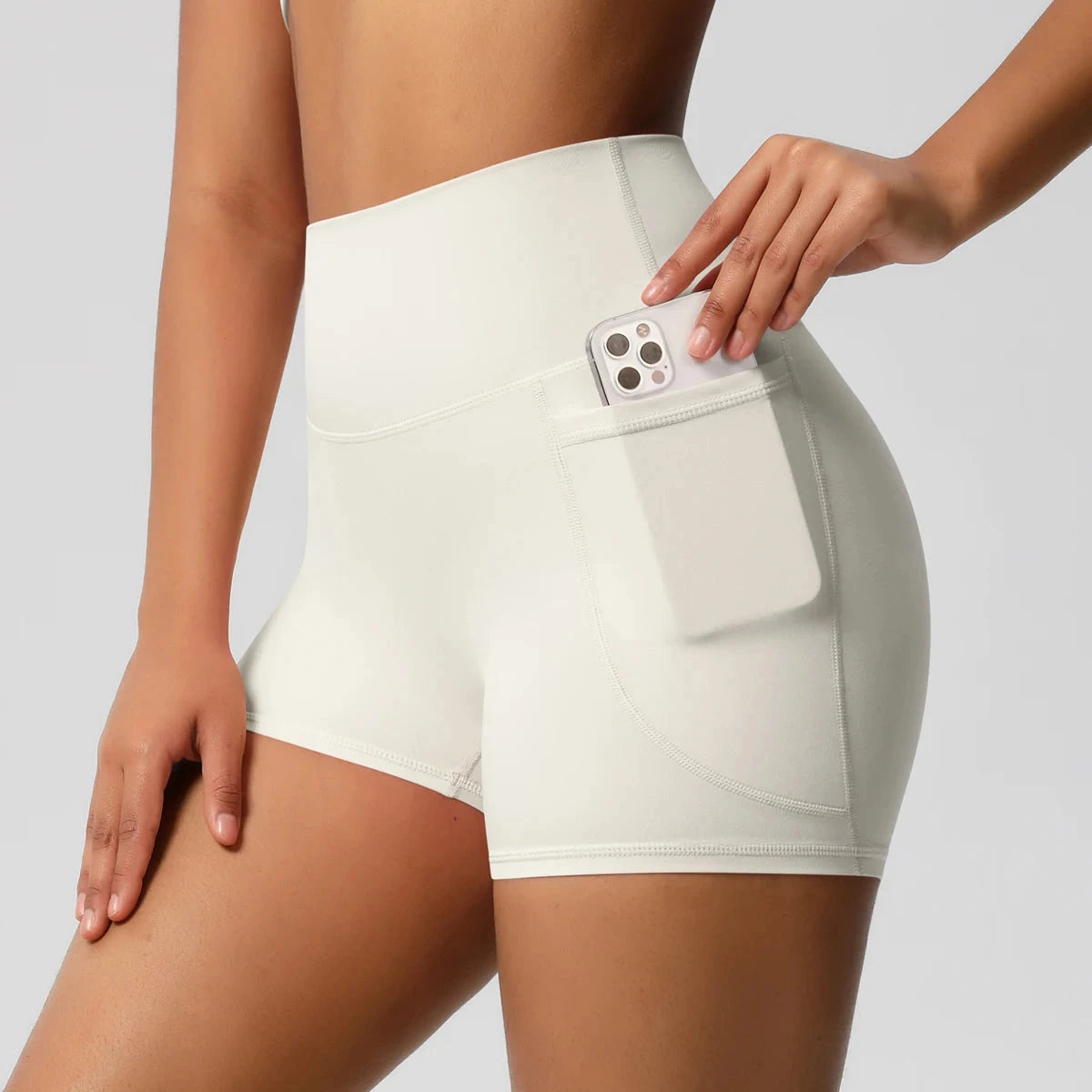 High-waisted bicycle yoga shorts by The Clothing Company Sydney, quick-drying, breathable workout pants with pockets for women.