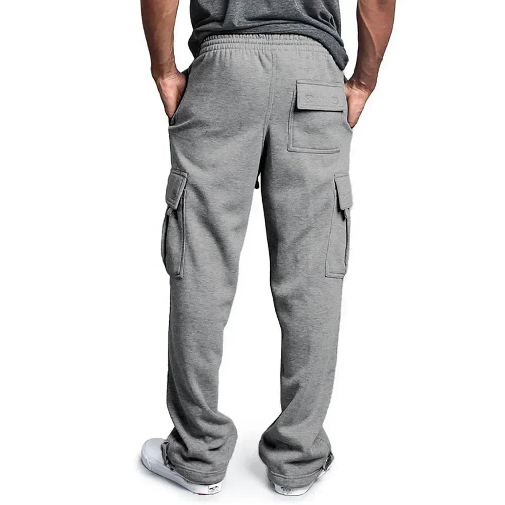 Men's cargo jogger pants by The Clothing Company Sydney featuring fleece material, loose fit, multiple pockets, and streetwear style.