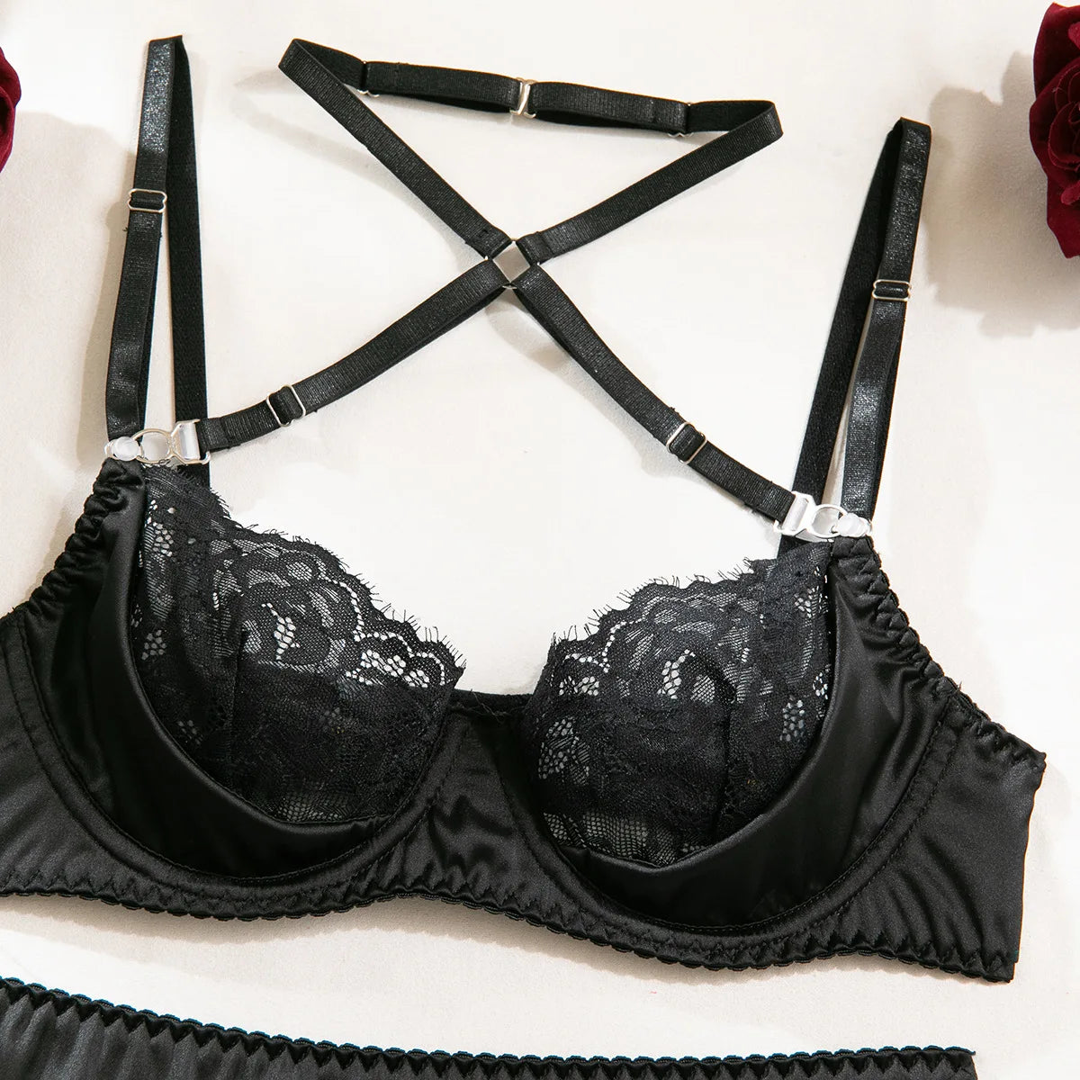 Lace lingerie set by The Clothing Company Sydney featuring a halter bra, heart g-string, thongs, and garter ensemble in exotic style.