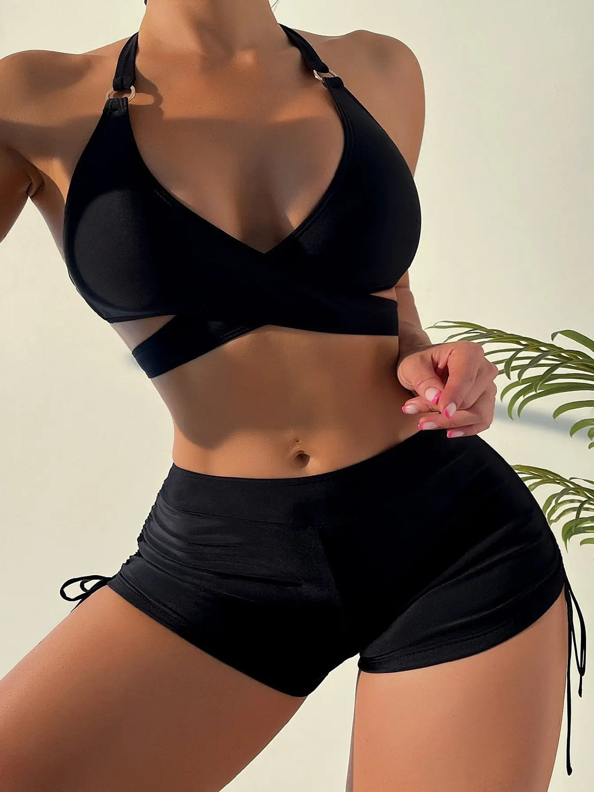 High waist two-piece bikini with solid hollow design and gathered details, perfect for summer beachwear from The Clothing Company Sydney.