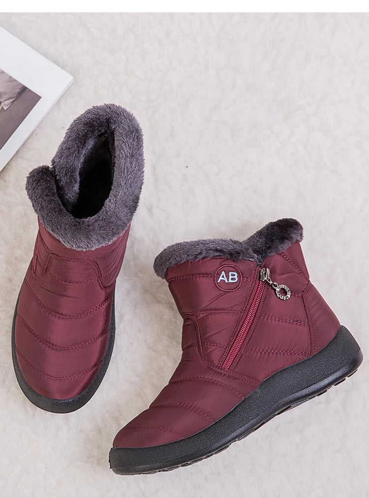 Women's winter snow boots with warm fur lining and ankle height, designed for cold weather comfort and style.